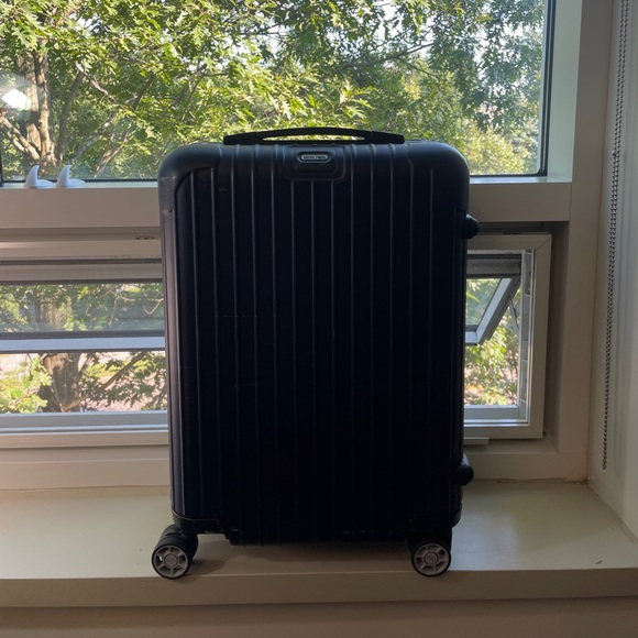 RIMOWA Bags Rimowa Navy Carry On Poshmark